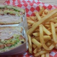 Grilled Turkey · With melted Swiss cheese.
