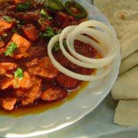 Chicken Tikka And Rice Or Naan · Spicy. Oven baked chicken simmered in sweet and spicy tomato creamy sauce.