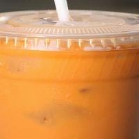 Thai Iced Tea · Brewed thai tea with condensed milk topped with half and half.
