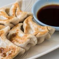Pot Stickers (6) · Handmade house special dumpling with pork and vegetables