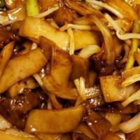 Beef Chow Fun · with chili peppers, onions, and bean sprouts