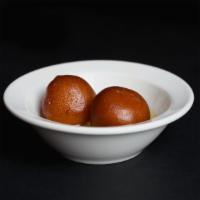 Gulab Jamun (2Pcs) · Dough balls soaked in light sugary syrup flavored with green cardamom, rose water and saffron.