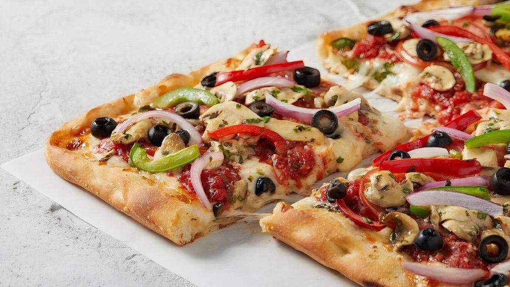 Roman Veggie Slice · Thick, Sicilian-style crust, hand-crushed Roman sauce, freshly shredded 100% whole milk mozzarella, fresh spinach, sliced tomatoes, mushrooms, a mix of green and red peppers, red onions, and black olives. Made fresh daily..