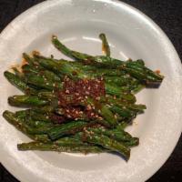 Spicy Green Beans · Pan fried green beans with garlic sauce and sesame seeds.