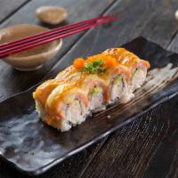 Baked Salmon Roll · Crab, avocado. Topped with salmon baked in dynamite sauce.