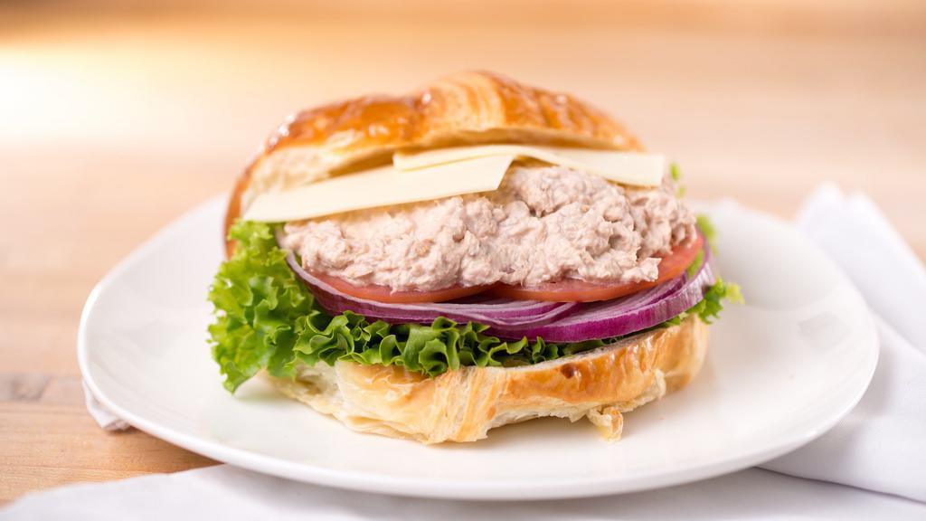 Tuna & Cheese Croissant · Mayonnaise, Lettuce, Tomatoes, Onions, Pickles, Tuna, and Cheese.