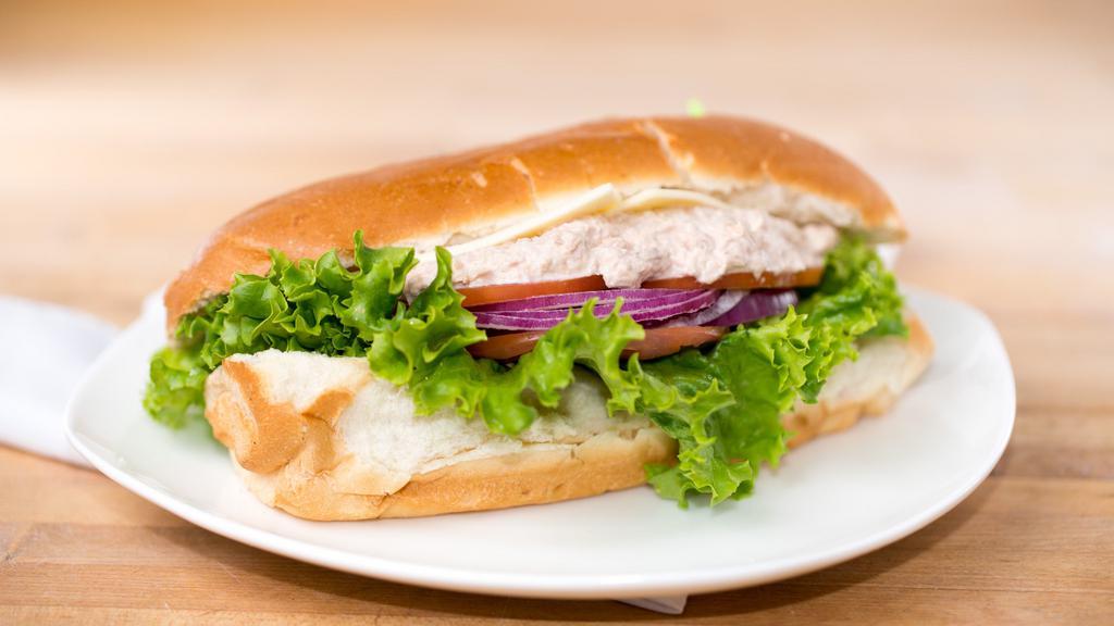 Tuna & Cheese Sub · Mayonnaise, Lettuce, tomatoes, Onions, pickles, tuna and cheese.