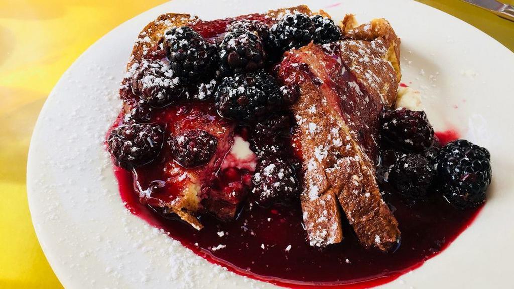 Blackberry Stuffed French Toast · Ricotta, Blackberry Compote and Fresh Mixed Berries