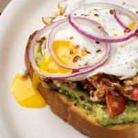 Avocado Toast · Avocado mash on a toasted Texas slice (or your choice of bread), topped with 2 eggs any styl...