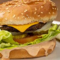 1/3 Lb Angus Hamburger · 100% certified Angus Beef. Served with 1000 island dressing, Tomato, Onion, Lettuce, and Pic...