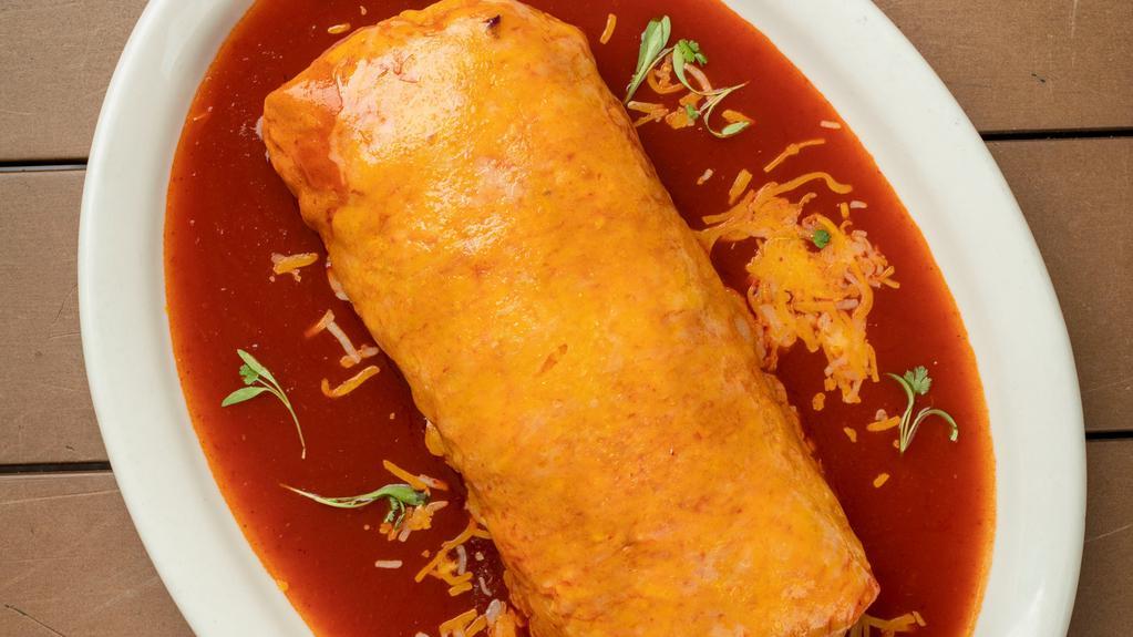 Ted'S Wet Burrito (Available Only After 2Pm) · Red or Green Salsa. Your choice of Meat, Pinto Beans, Rice, Pico de Gallo, Guacamole, Monterey Jack & Cheddar cheese blend.