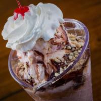 Ted'S Sundae · 2 scoops of ice cream, chocolate or caramel drizzle, peanuts, whipped cream, and a cherry on...