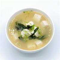 Miso Soup · Kelp broth with miso, tofu, wakame, seaweed and scallion.