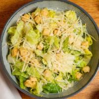 Caesar Salad · Romaine Lettuce, Croutons, Fresh Parmesan Cheese & Caesar Dressing.