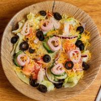 Chef’S Salad · Iceberg Lettuce, Cucumber, Red Onion, Olives, Turkey, Ham & mixed Cheese.