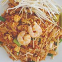 Pad Thai · Small rice noodle soft fried with egg, shrimp, chicken and bean sprouts, topped with crushed...