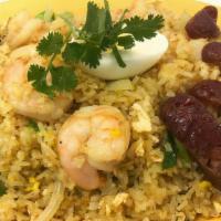 Yellow Curry Fried Rice · Fried rice scrambled with egg, shrimps, white and green onion topped with boiled egg and Chi...