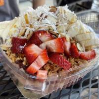 Acai Bowl · Acai, Honey Almond Granola, Strawberries, Banana, Shredded Coconut, Sliced Almonds, Honey Dr...