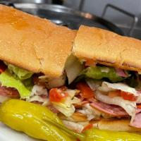 Italian Club Sandwich · Salami, Pepperoni, Canadian Bacon, Cheese, Lettuce, and tomato. Served on french bread with ...