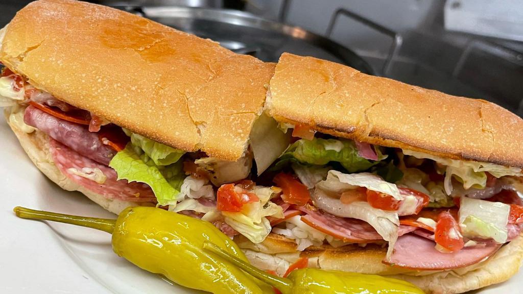 Italian Club Sandwich · Salami, Pepperoni, Canadian Bacon, Cheese, Lettuce, and tomato. Served on french bread with sauce.