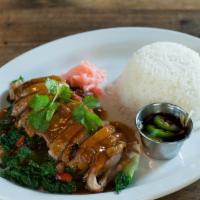 Kao Nar Bpet · Grilled honey roasted duck over rice.