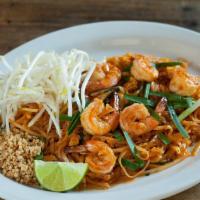 Pad Thai · Vegan/vegetarian possible.  Stir-fried rice stick noodle with egg, bean sprout, chive, and p...