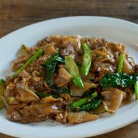 Pad Si Ew · Vegan/vegetarian possible.  Stir-fried wide rice noodle with Chinese broccoli and egg in sem...