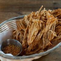 Peurk Tod · Vegetarian. Crispy taro fries served with sweet and sour sauce.