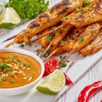 Chicken Satay · Marinated chicken skewers, served with a side cucumber salad and house made peanut sauce; 5 ...