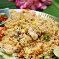 Combination Fried Rice · Fresh caught shrimp, pork, beef, and chicken stir fried with seasoned rice.
