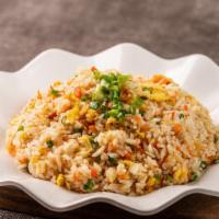 Seafood Fried Rice · Fresh caught seafood and veggies stir fried with seasoned rice.