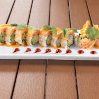 Citrus Roll · Shrimp tempura and cucumber inside topped with salmon, thinly sliced lemons, cilantro and sp...