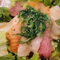 Sashimi Salad · Tuna, salmon, yellow tail, red snapper.