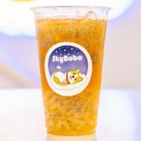 Lychee Bomb · Lychee green tea, topped with basil seeds, lychee jelly.
