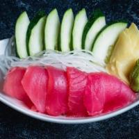 Tuna Sashimi (5Pc) · Sashimi Grade Sliced Raw Tuna. Serves with Wasabi, Ginger, Soy Sauce.