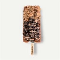 The Cookie Monster · cookies n cream pop + milk chocolate dip + chip ahoy crumbs and Oreo crumbs topped off with ...