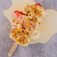 Tres Leches Pop · blue vanilla pop + fresh cut bananas & strawberries + buttered maria's and topped off with o...