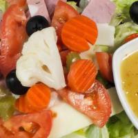 Mixed Antipasto Salad · Iceberg and romaine lettuce, red cabbage, ham, salami, provolone, mortadella, black olives, ...