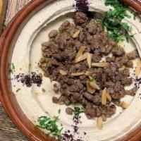 Meat Over Hummus · Hummus topped with pan sauteed diced beef.