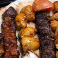 Grill For 2 · Grilled beef, kefta and chicken kabab. Served with salad and rice. (Includes pita bread)