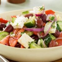 Greek Salad · Variation of greens, tomatoes, cucumbers, olives, feta cheese, and Greek dressing.