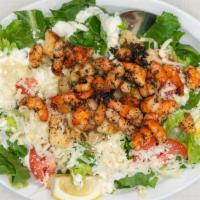 Shrimp Caesar Salad · Green salad with caesar dressing and cheese.
