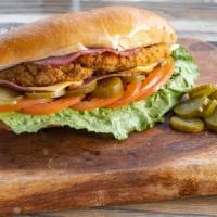 Supreme · Chicken tender sandwich with garlic sauce, pickles, fresh lettuce, tomatoes, and swiss cheese