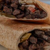 Beef Shawarma Wrap · Special made beef wrapped with Parsley, Red Onions, Tomatoes, Pickled Turnips, and Tahini in...