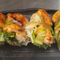 Grilled Shrimp Roll · Vermicelli, lettuce, mint, cucumber, and fried shallot
wrapped in rice paper. Served with ho...