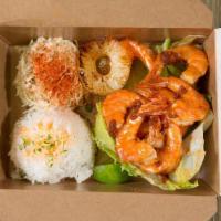 Shrimp Combo · 8 pieces of headless shrimp, choice of sauce with steamed rice and choice of side.