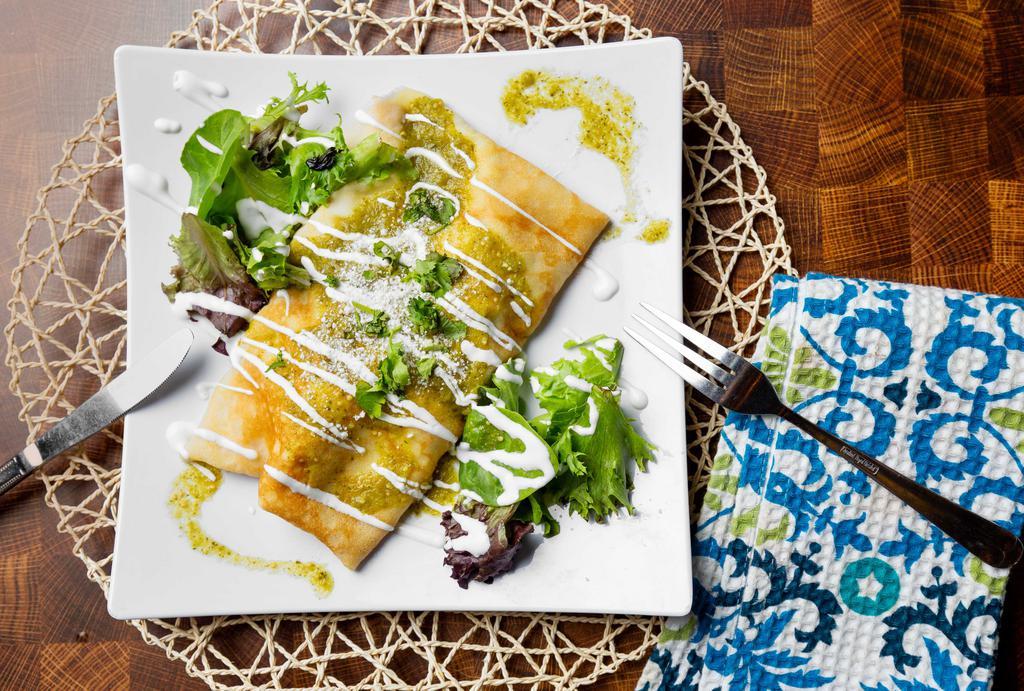 Chicken Enchilada Crepe · Chicken with monterrey cheese. Topped with green sauce, sour cream, cotija cheese and cilantro.