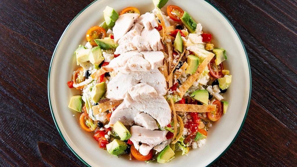Southwest Salad · Romaine lettuce, avocado, roasted red bell pepper, black beans, tomato, corn strips, queso fresco,  house made chili spiced dressing. (Shown with smoked chicken +$6)