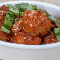 Housemade Italian Meatballs (4) · Housemade Italian meatballs (pork and beef).