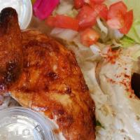 1/4 Chicken Plate · Quarter golden roasted chicken, white or dark. Hummus, salad, rice, garlic and 2 pita bread.
